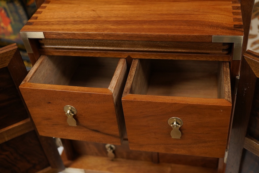 A Chinese three sectioned incense case, a two door fitted cabinet- 29cm high and a sliding topped box